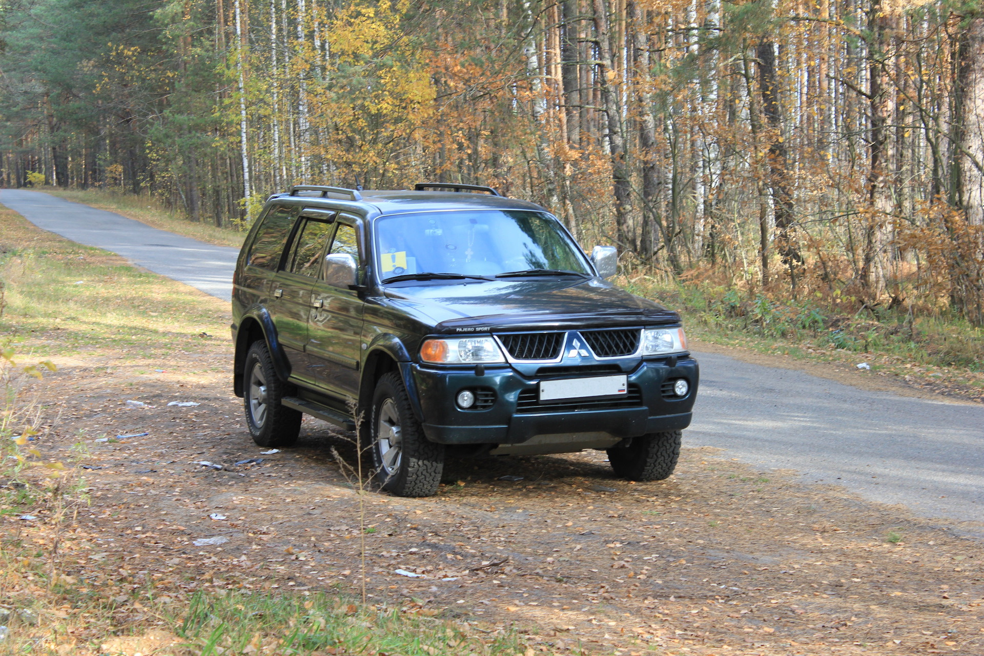 Pajero sport 1 рестайлинг. Mitsubishi Pajero Sport 1. Митсубиси Паджеро спорт 2007. Mitsubishi Pajero Sport 2007. Митсубиши палжеро спорт1.