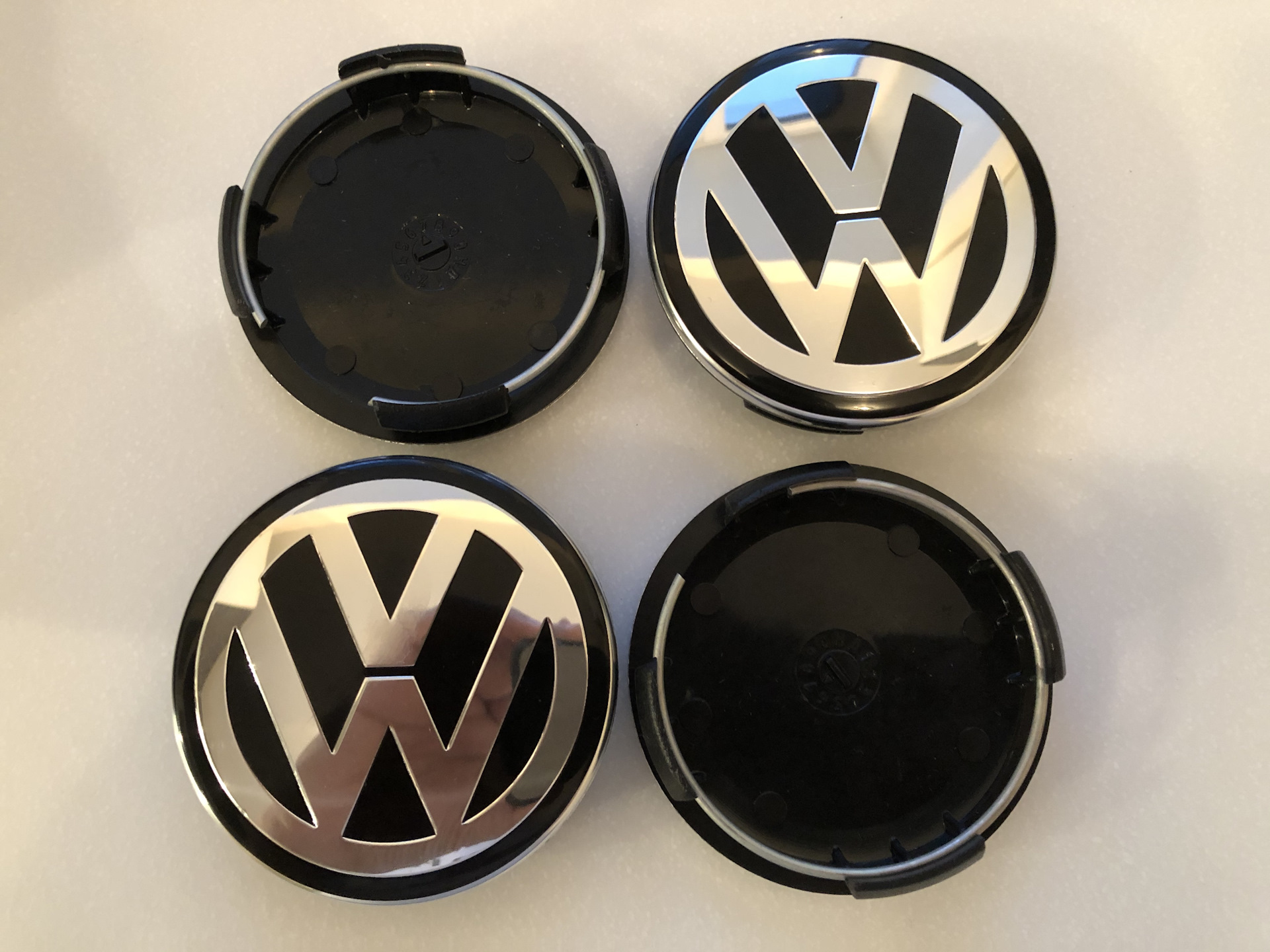 Колпачки volkswagen. Заглушки ступицы на штампованные диски на 16 Volkswagen Tiguan. Ступичные колпачки Tiguan 1. Заглушки VW Tiguan. C570-2 колпачок ступицы VW артикул.