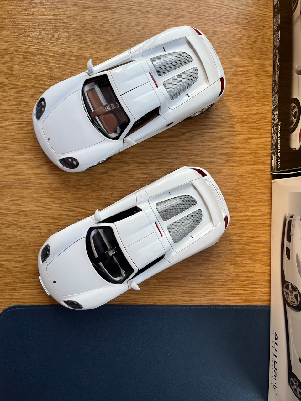 Porsche Carrera GT 1:18 производителей Autoart и Minichamps, найти