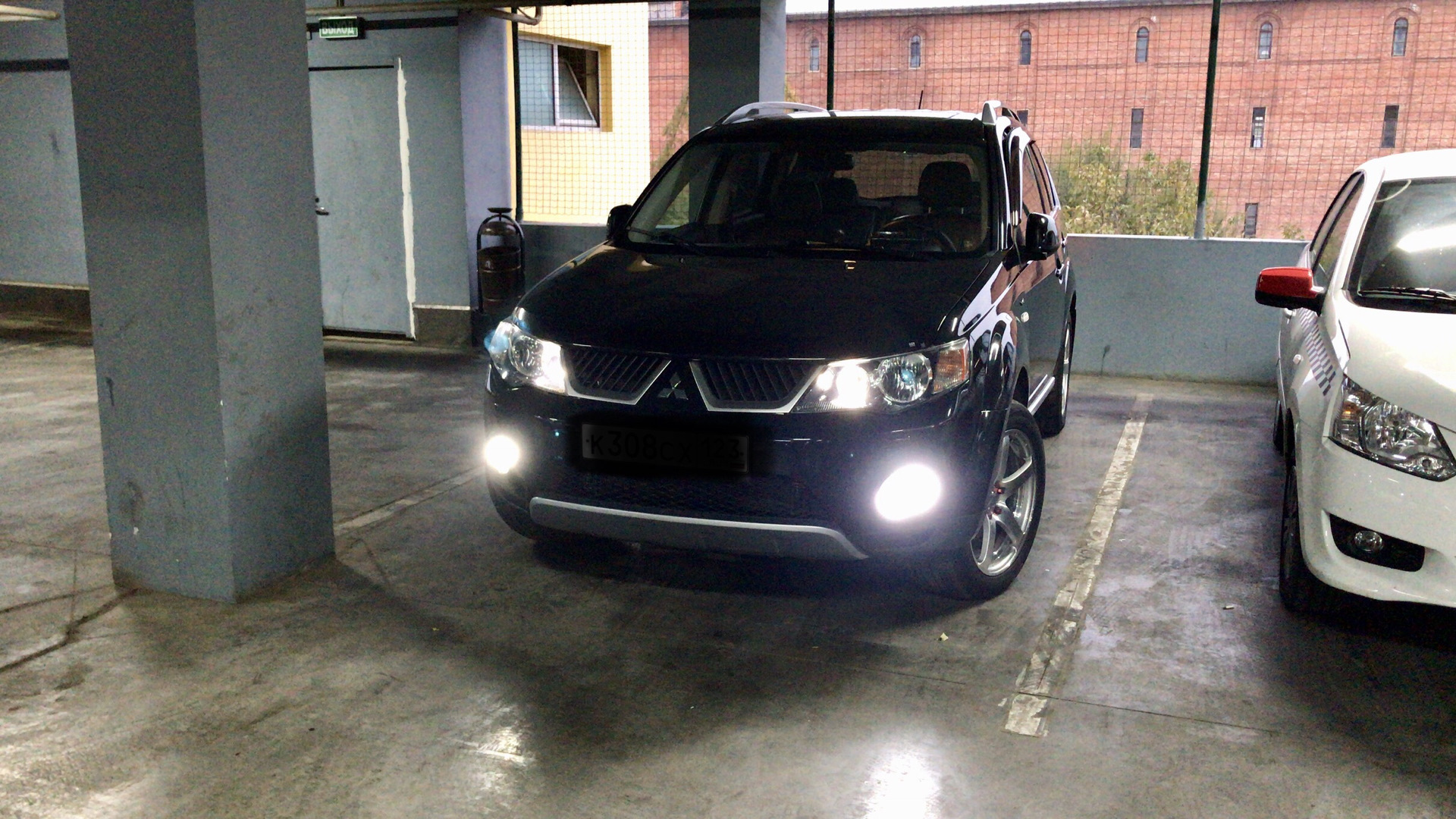 headlamp leveling service required mitsubishi outlander xl