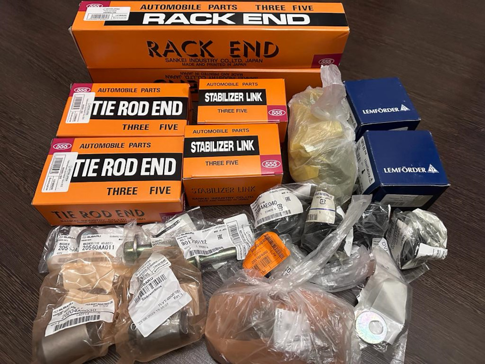 Рулевые тяги, наконечник, стойки и втулки переднего и заднего стабилизатора, шаровые, сайлент блоки переднего рычага, развальные болты — Subaru Legacy (BL/BP). Запчасти на фото: 20550A, 20560AA011