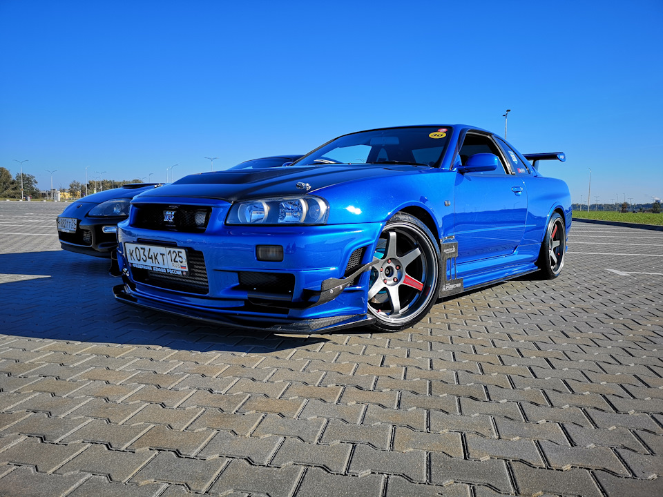 К 34. Nissan Skyline gt-r Vspec r 34. GTR 34 Vspec. К034кт125. Nissan Скайлайн 34 голубоватого цвета.