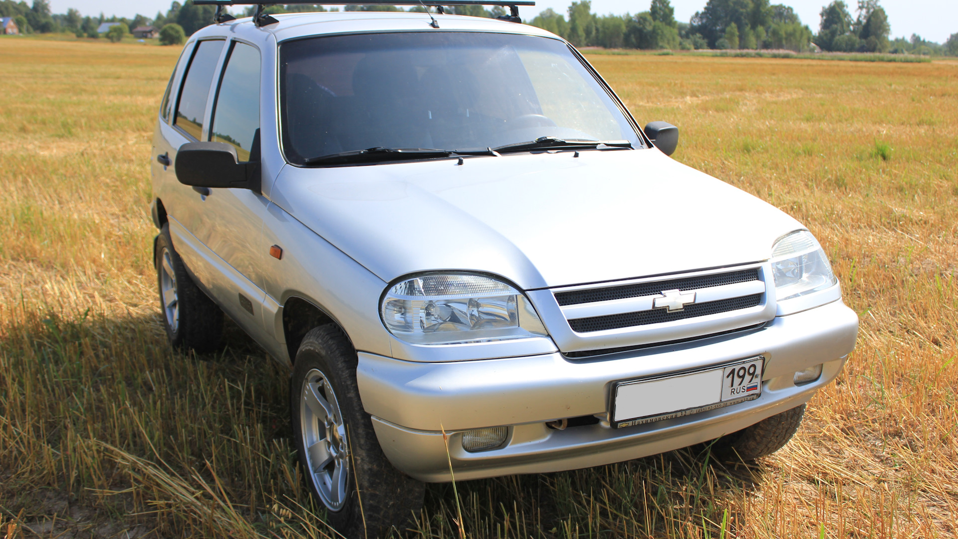 Шевроле нива отзывы. Chevrolet Niva GLX. Chevrolet Niva GLX 1.7 MT 4×4 механика бензин. Шнива 1 поколение GLX. Отзыва владельцев Нива Шевроле GLX С фото.