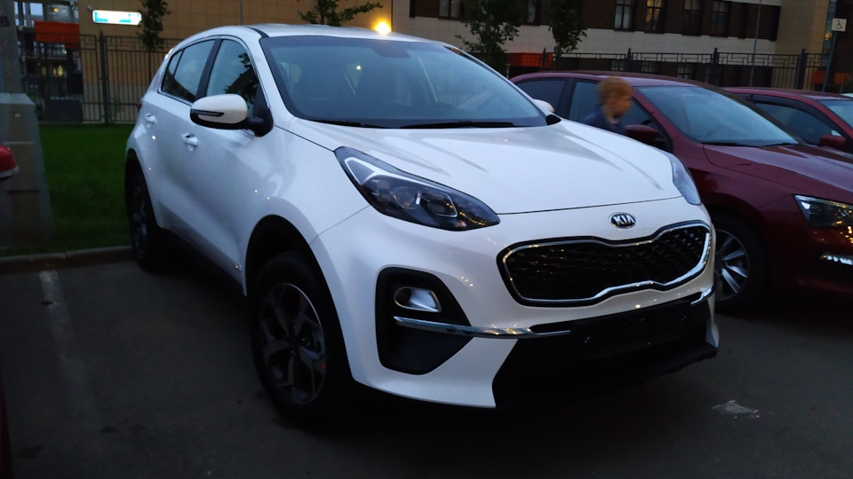 KIA Sportage 2.4 Белый перламутр