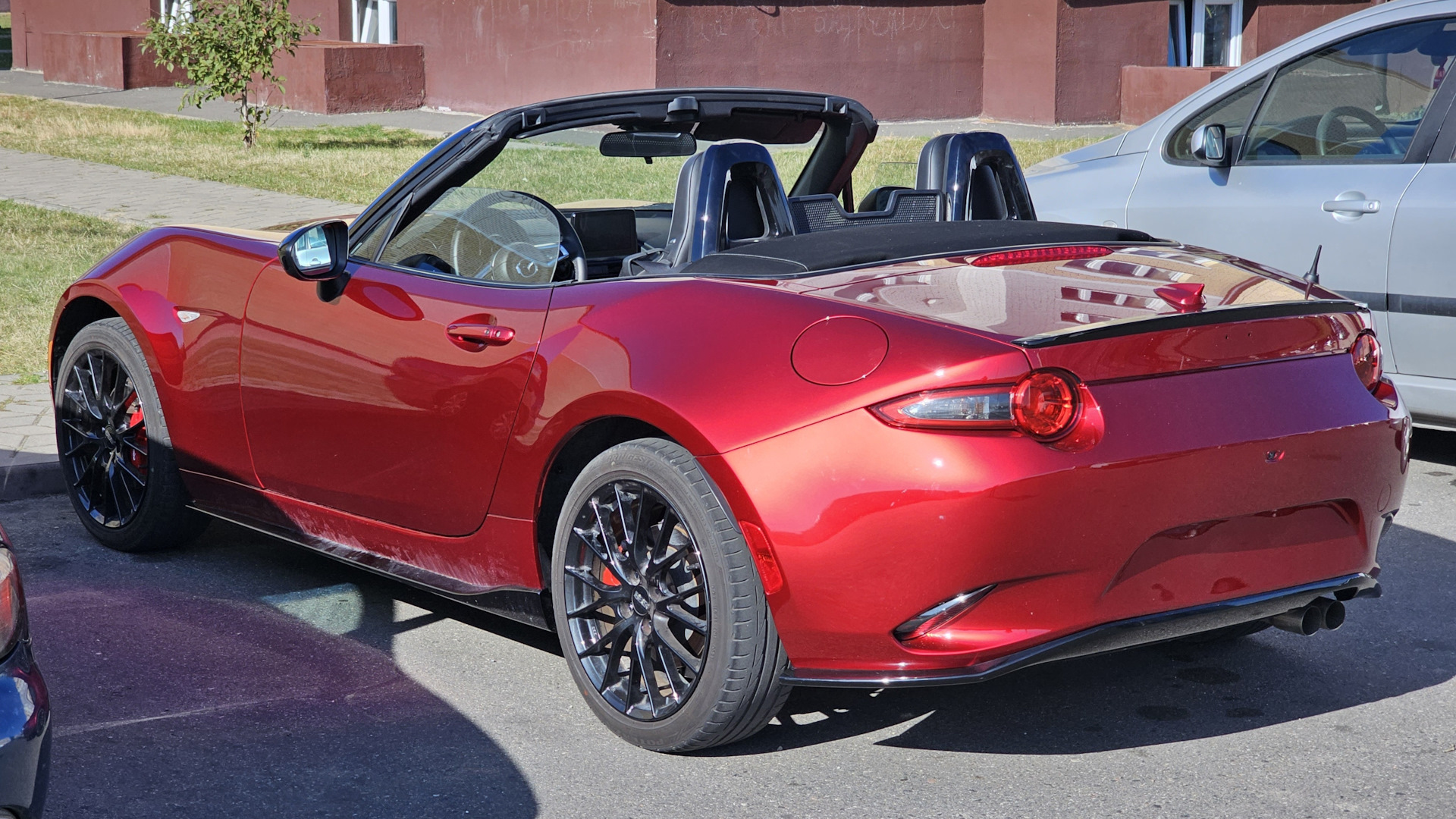 2021-mazda-mx-5-sport-venture-deep-crystal-blue-mica-driving