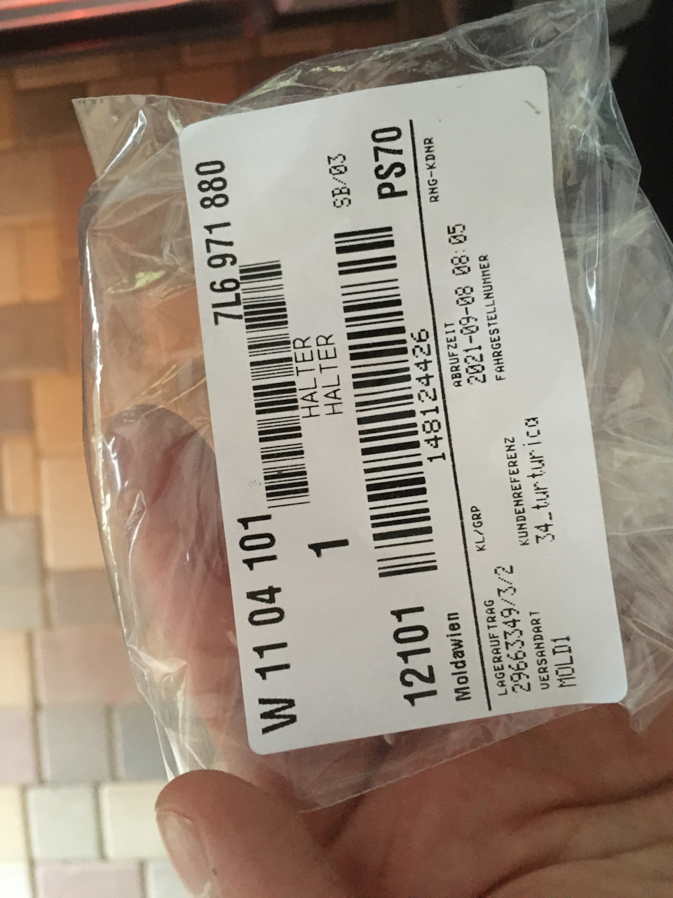 7L6971880 — Volkswagen Passat Variant (B6). Запчасти на фото: 7L6971880, 990808