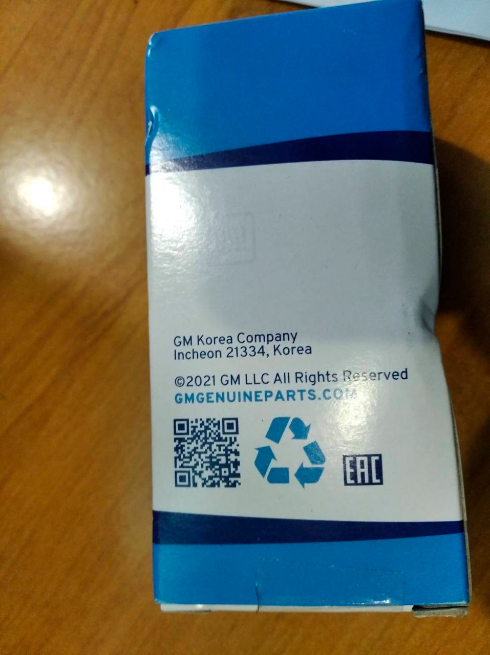 Обратная сторона коробки, на ней можно увидеть часть защиты с надписью GM — Chevrolet Lacetti SW. Запчасти на фото: Z1334