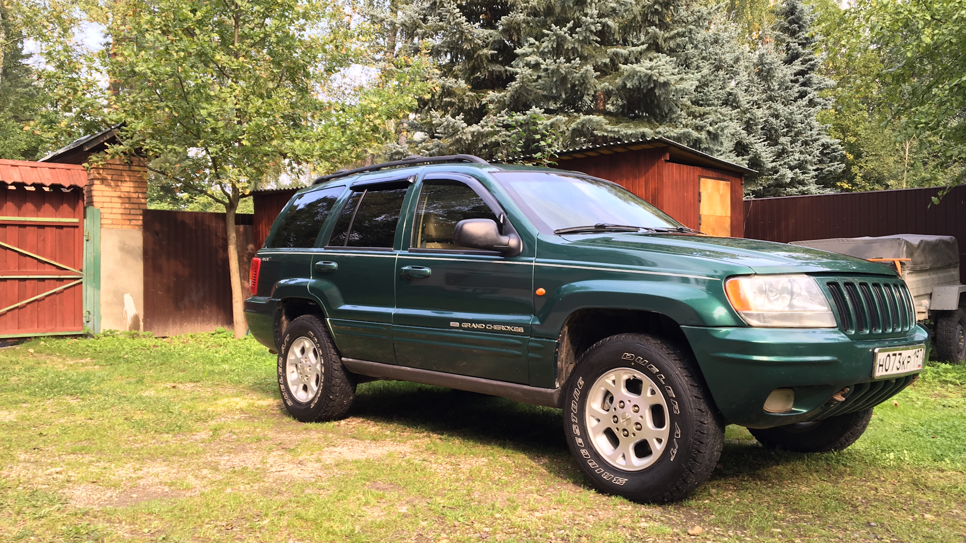 Дромбаза. Jeep Grand Cherokee WJ 1999 люк. Grand Cherokee WJ vs Chevrolet Blazer II. Внедорожники до 300000. Джип до 100000.