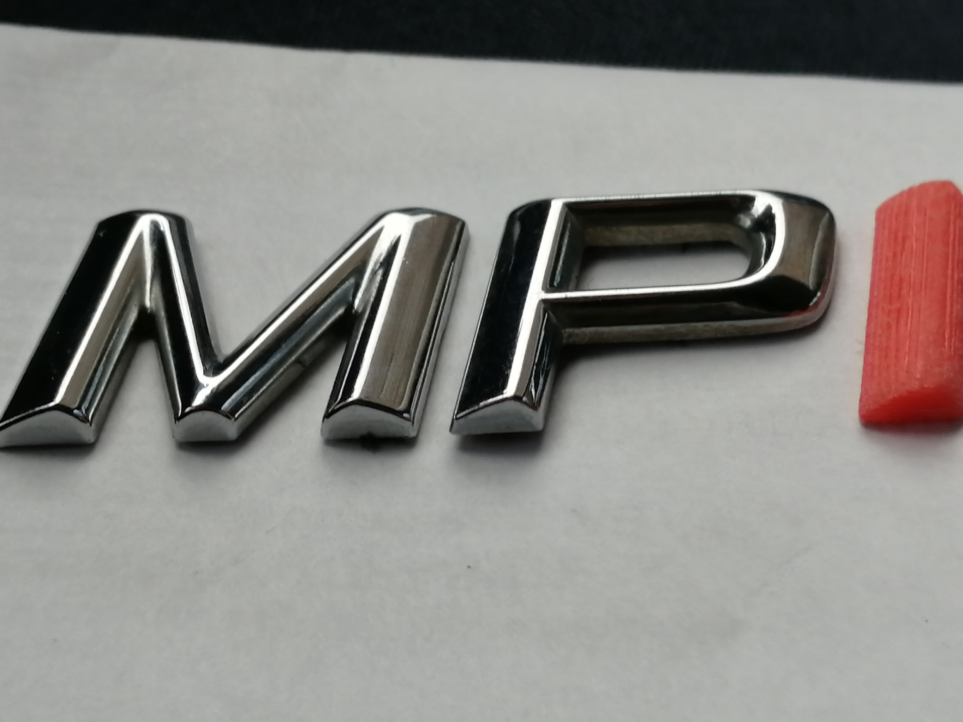 Шильдик буквы. Шильдик MPI Skoda.