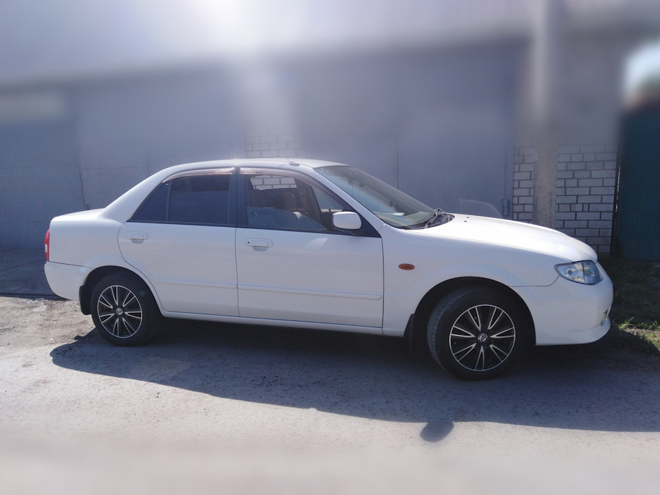 Защитное средство во внутренние полости кузова. — Mazda Familia (BJ), 1 ...