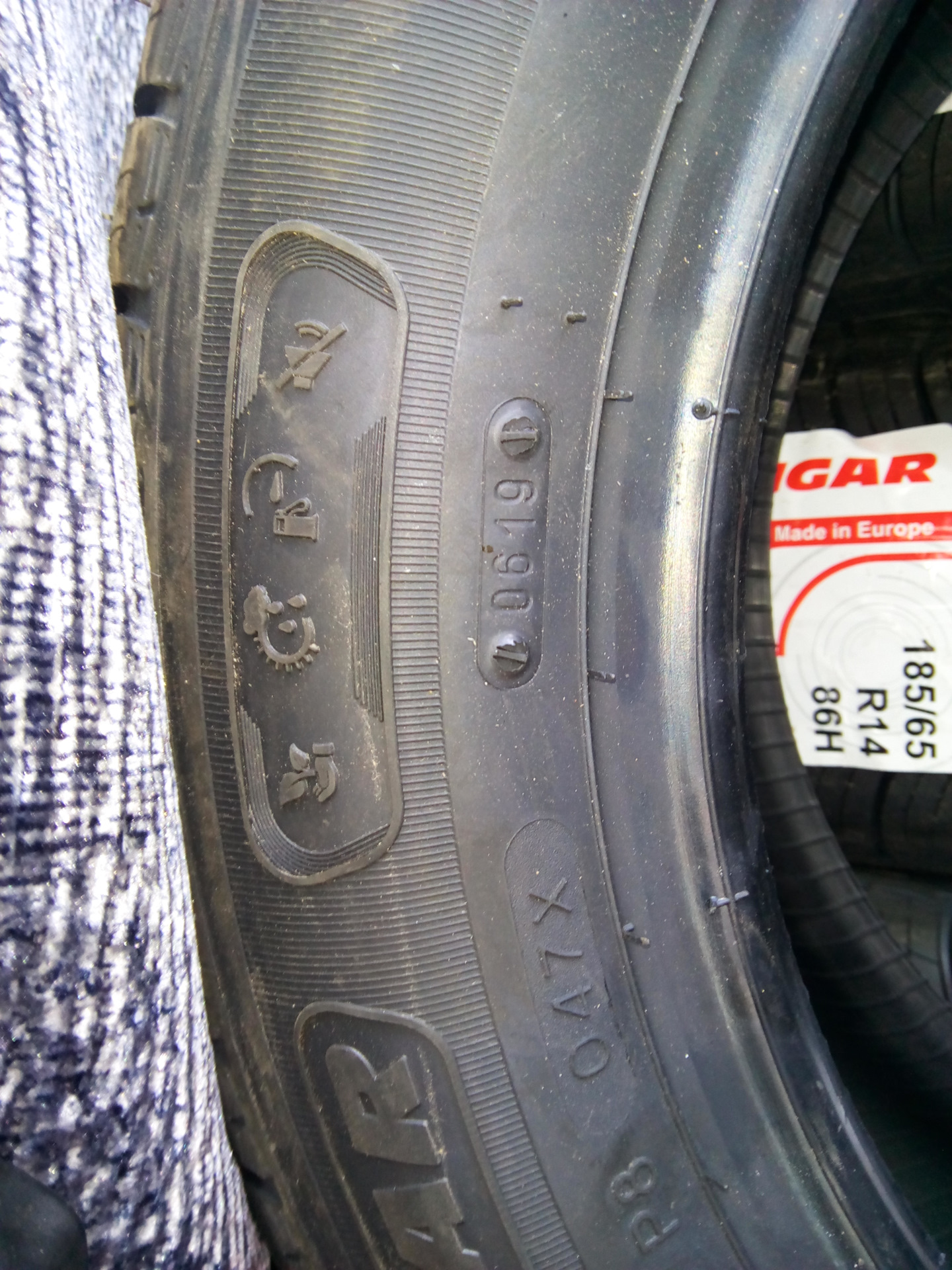 Год выпуска на шинах кама. Tigar Touring 185/65 r14. Шины Кама Флейм Дата производства. Штатная резина на калине Кама 217. Кама 217 r13 Дата изготовления резины.