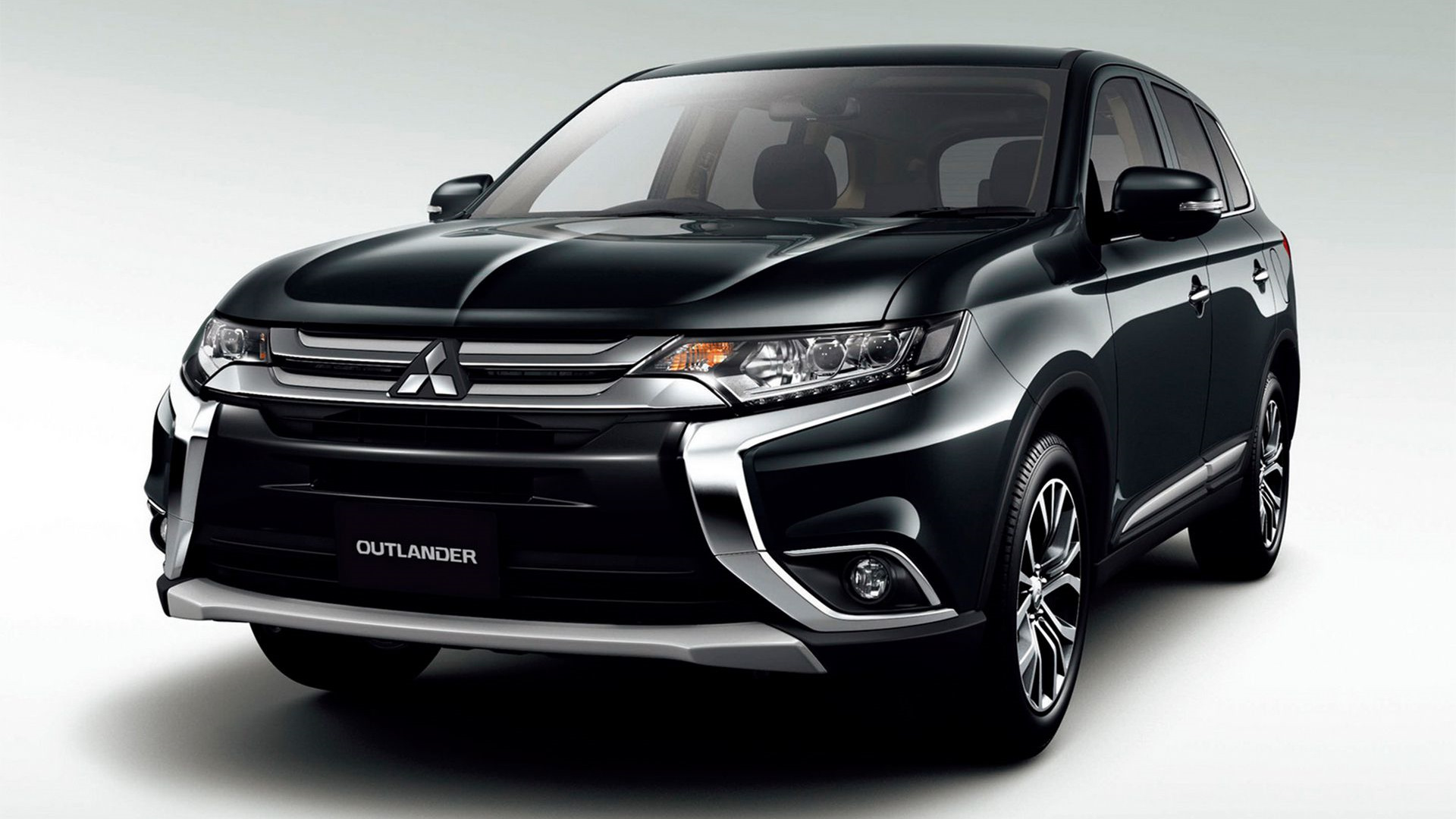 Новый mitsubishi outlander. Новый Митсубиши Аутлендер. Новый Митсубиси Аутлендер. Mitsubishi Аутлендер новый. Мицубиси Аутлендер 2015.