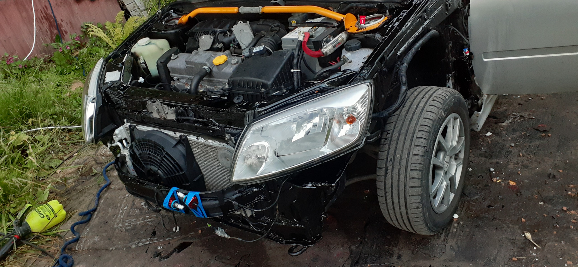 Removal and installation of the front wing Lada Granta