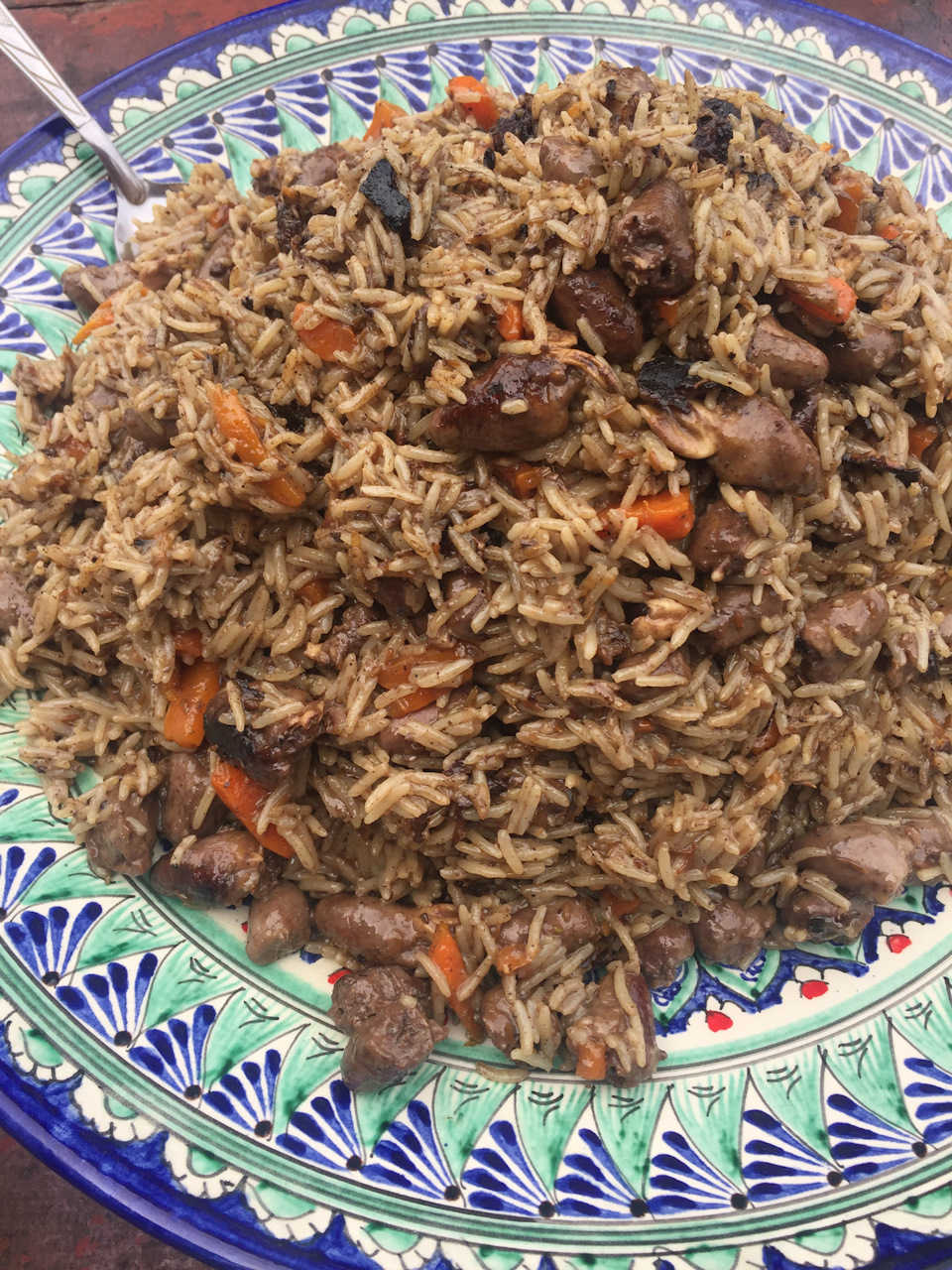 Плов с куриными сердечками