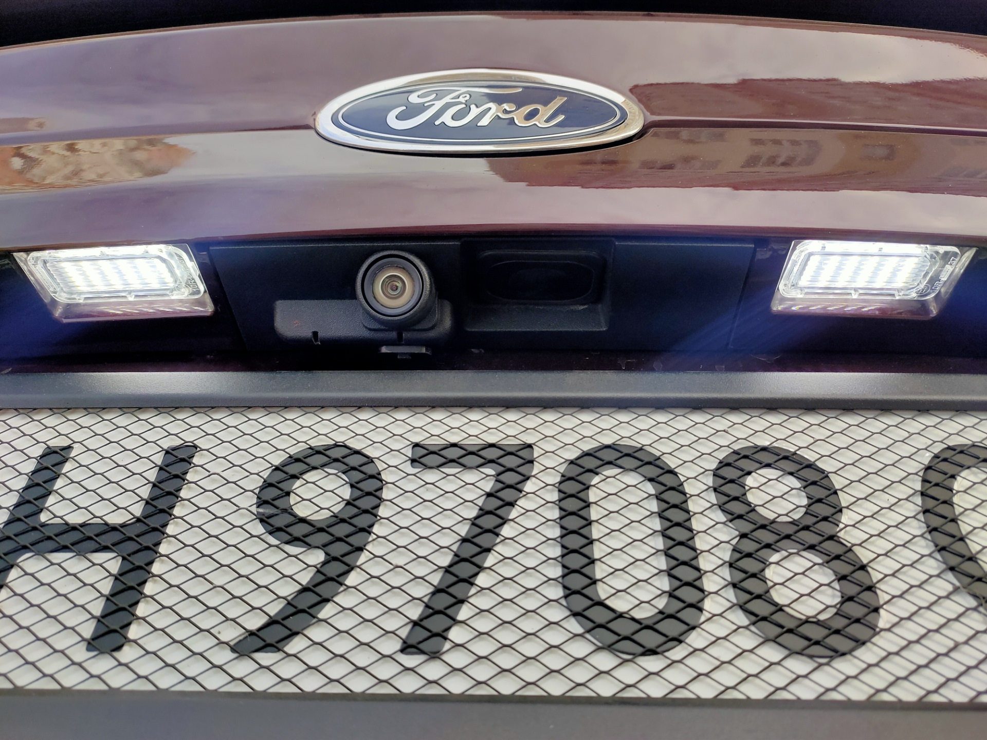 Купить номера на форд. Лампа подсветки номера Форд Фьюжн. Подсветка номерного знака Форд рейнджер 2017. Подсветка номера Форд эксплорер 5 лед.
