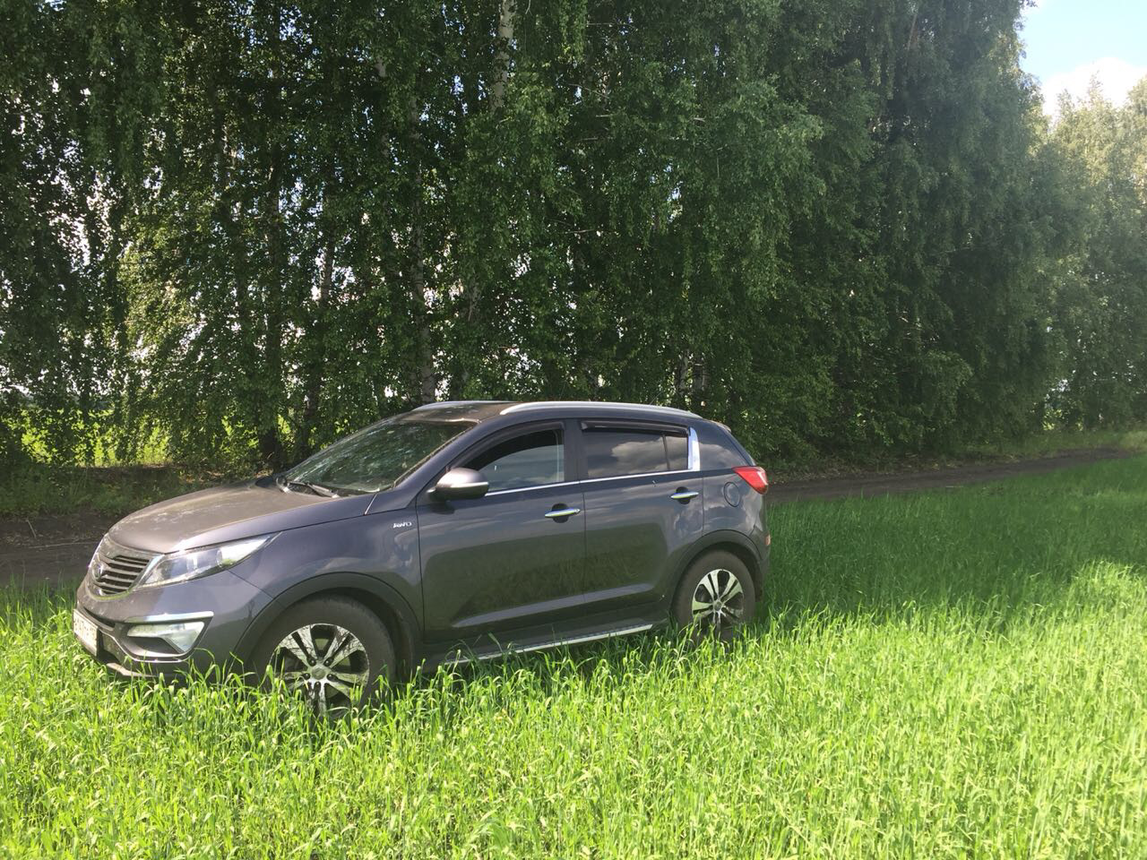 Загородный дом Kia Sportage