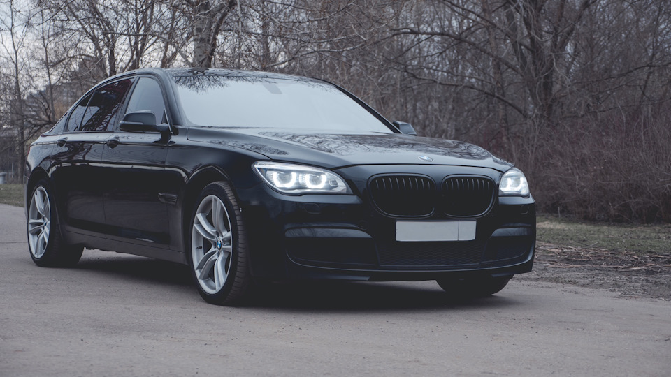 Bmw 7 Series Individual Orange Drive2