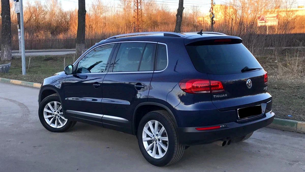 Фольксваген тигуан механика отзывы. Фольксваген Тигуан 11 года. VW Tiguan 2015. Volkswagen Tiguan 2015 черный. Фольксваген Тигуан 2015.