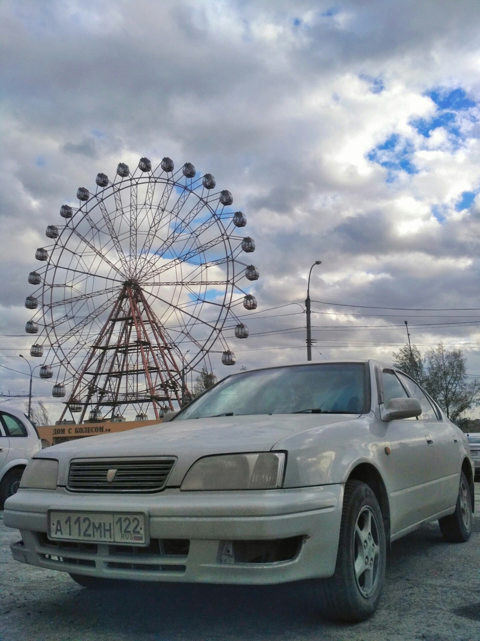 Фотография «Сфоткай меня на фоне колеса . Ок!)»