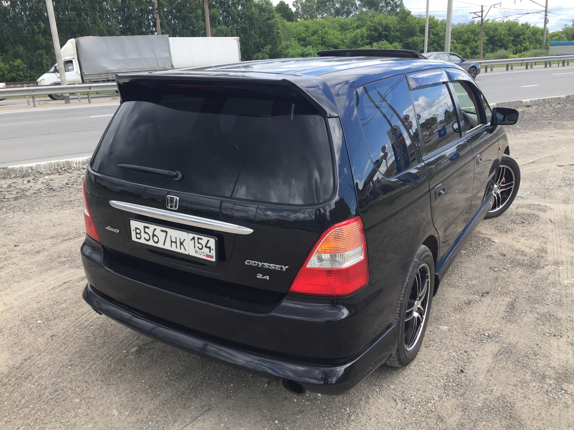 Хонда одиссей 2000. Хонда Одиссей черный. Honda Odyssey Black. Тонированная Хонда Одиссей. Одиссей 2 черный.