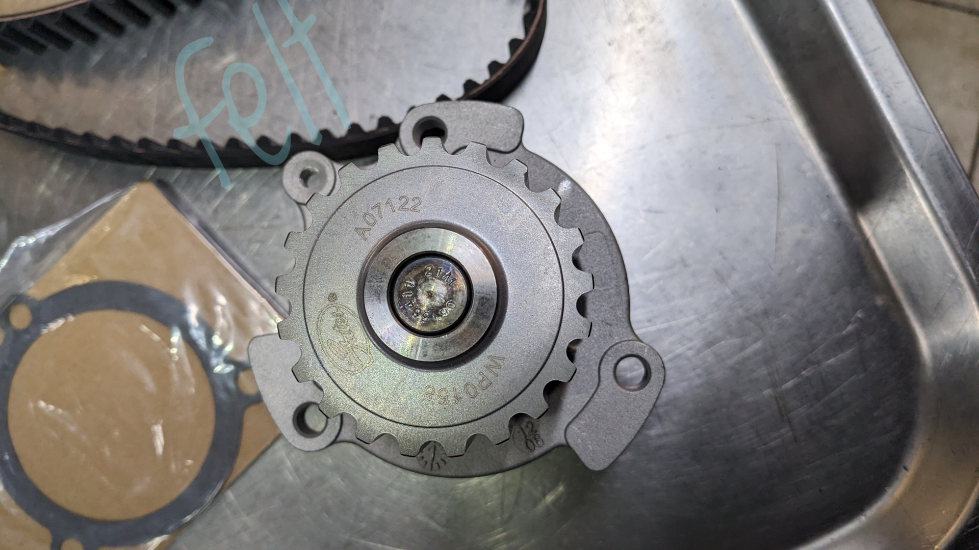 Замена ГРМ. Установка ГРМ GATES KP15631XS-1. Установка новой помпы ...