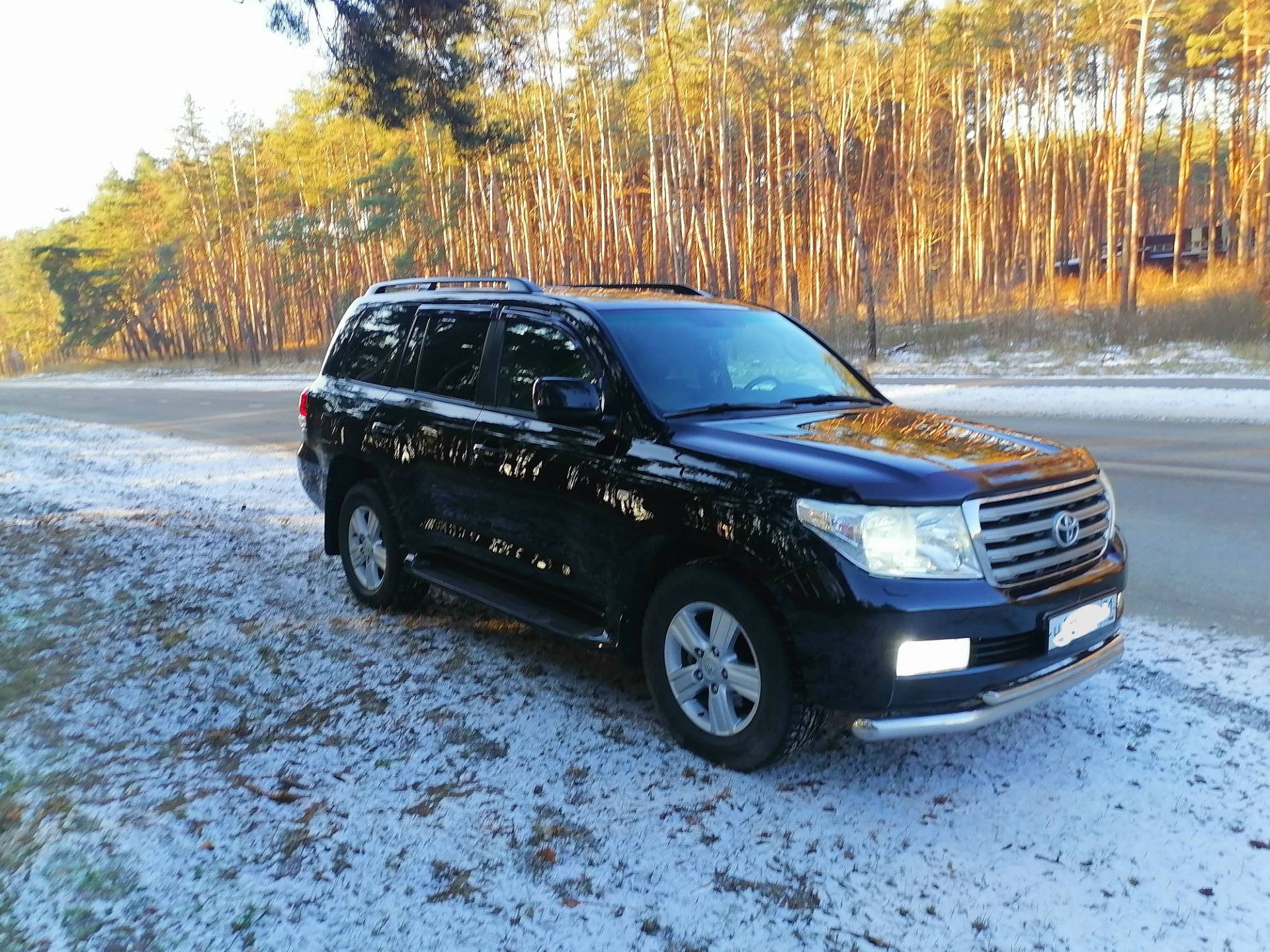 Крузер владивосток. Тойота ленд Крузер 200 2010г. Toyota Land Cruiser 200 Series черный. Toyota Land Cruiser 200 2010 зима. Ленд Крузер 200 2010 тонированный.