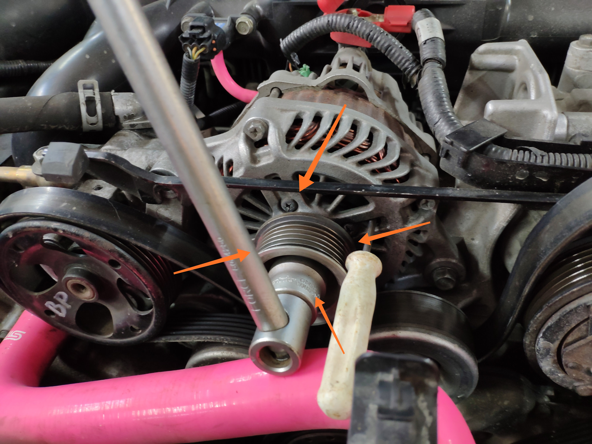 снять генератор субару