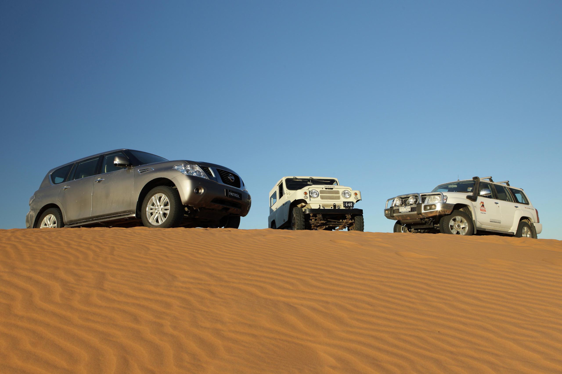 Nissan Patrol Dakar. Ниссан Патрол и ленд Крузер. Mitsubishi Pajero vs Nissan Patrol. Nissan Patrol Top Gear.