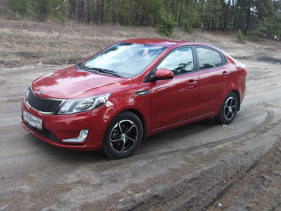 Kia Rio 3 красный 2011