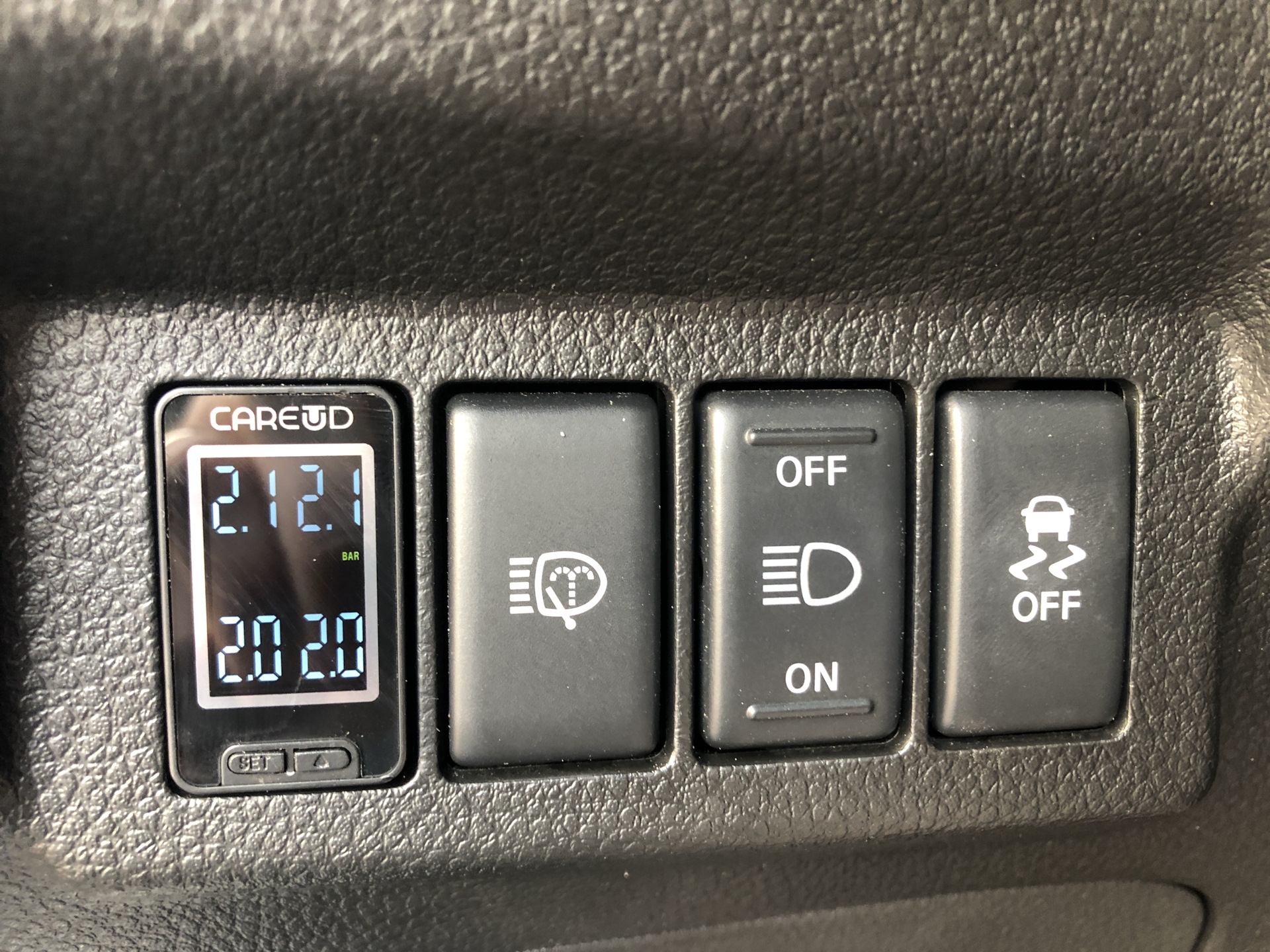 Где находится кнопка tpms