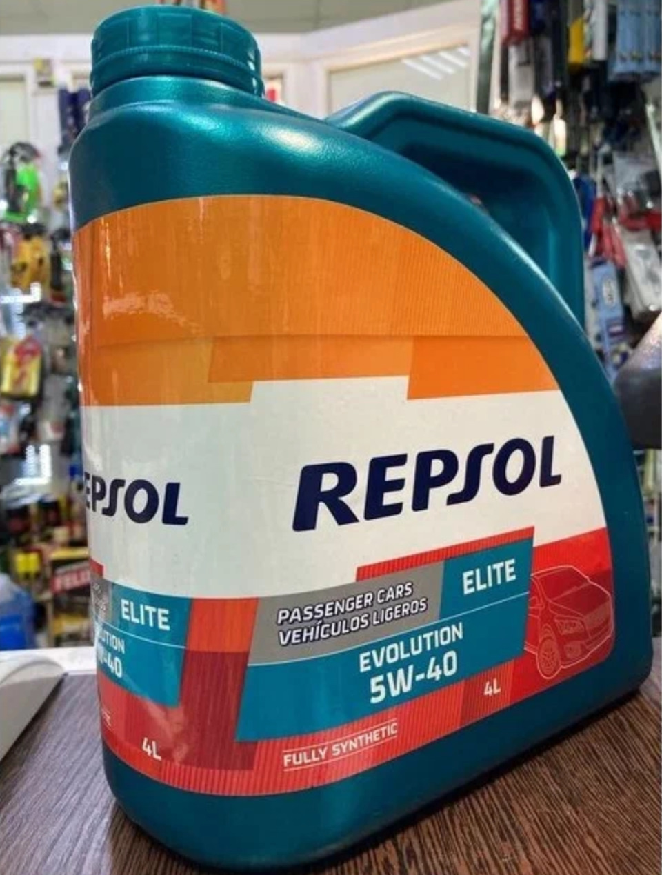 Repsol elite evolution отзывы. Repsol Elite Evolution 5w40. Масло Repsol Telex HVLP 32. Репсол масло бочки