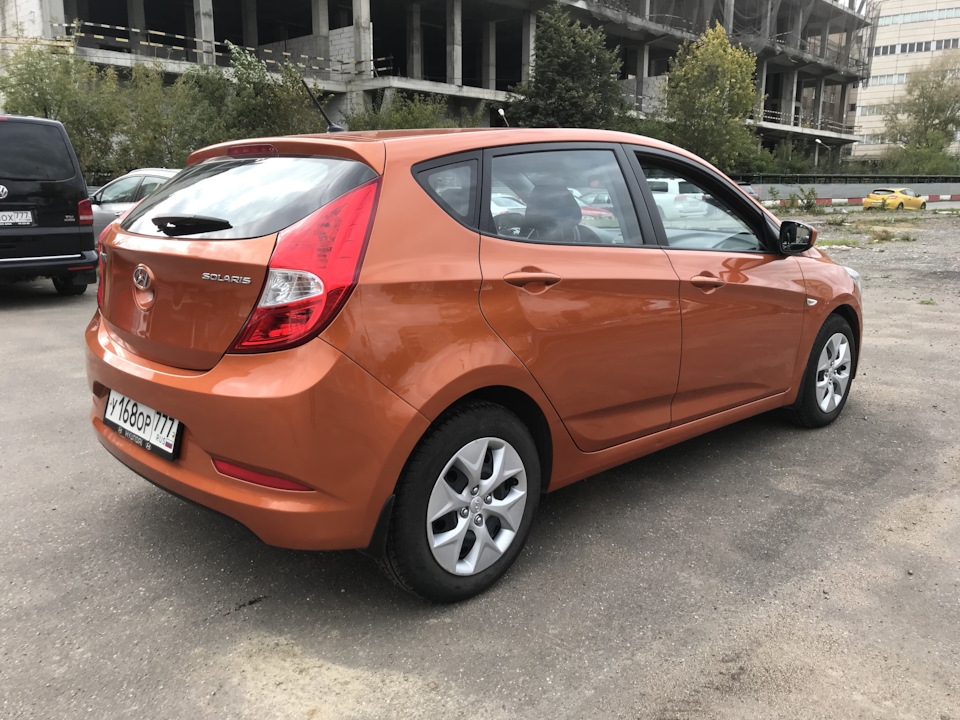 Hyundai Solaris 1 Рестайлинг оранжевый. Hyundai Orange.