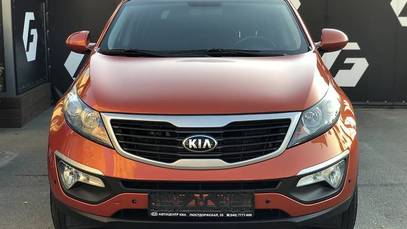 Kia Sportage оранжевая 2012