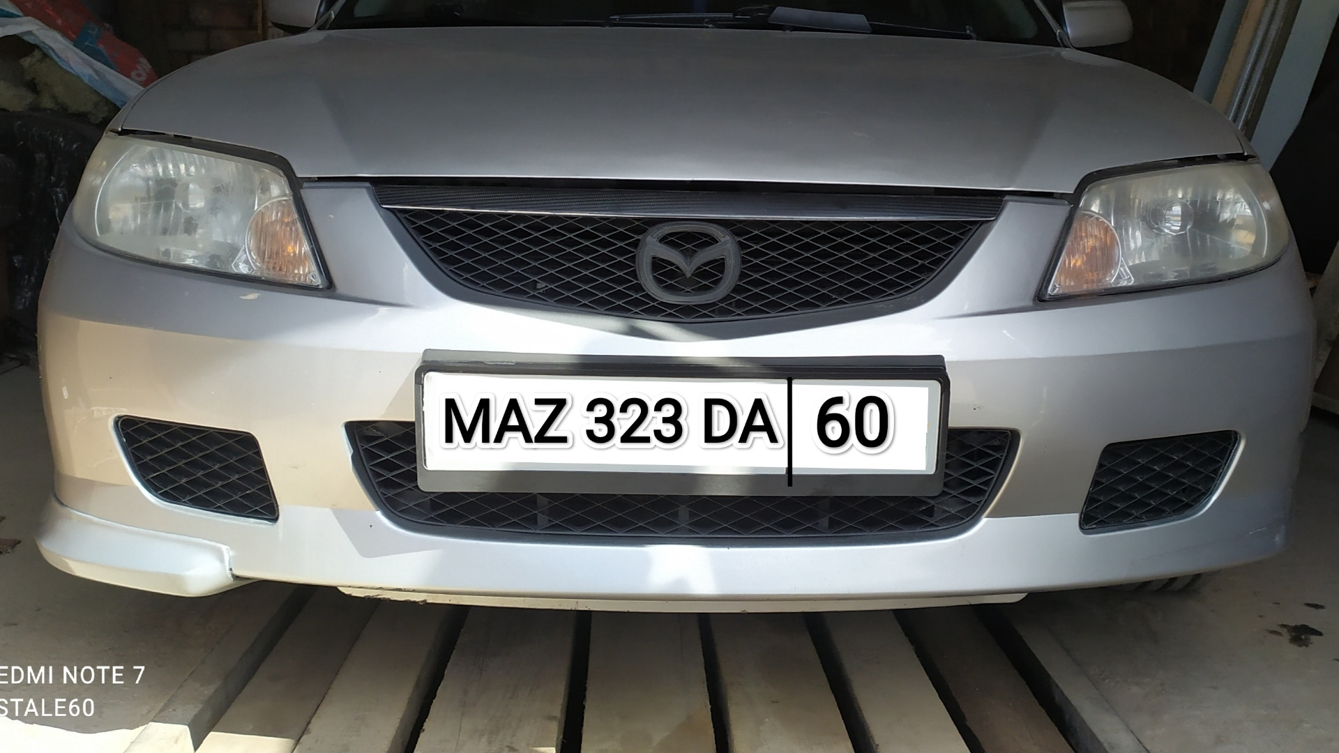 Клыки бампера от LARGUS — Mazda 323 VI, 1,6 л, 2001 года | тюнинг | DRIVE2