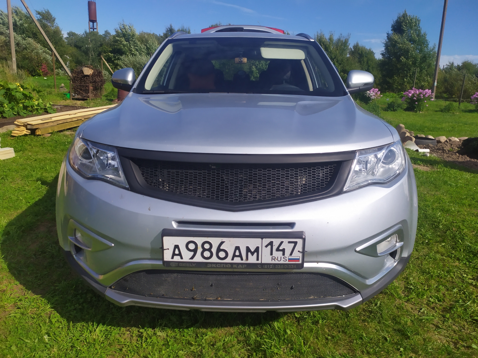 Решетка geely atlas. Защита радиатора джили атлас. Geely atlas черная решетка. Geely atlas решетка радиатора. Решетка радиатора geely atlas.