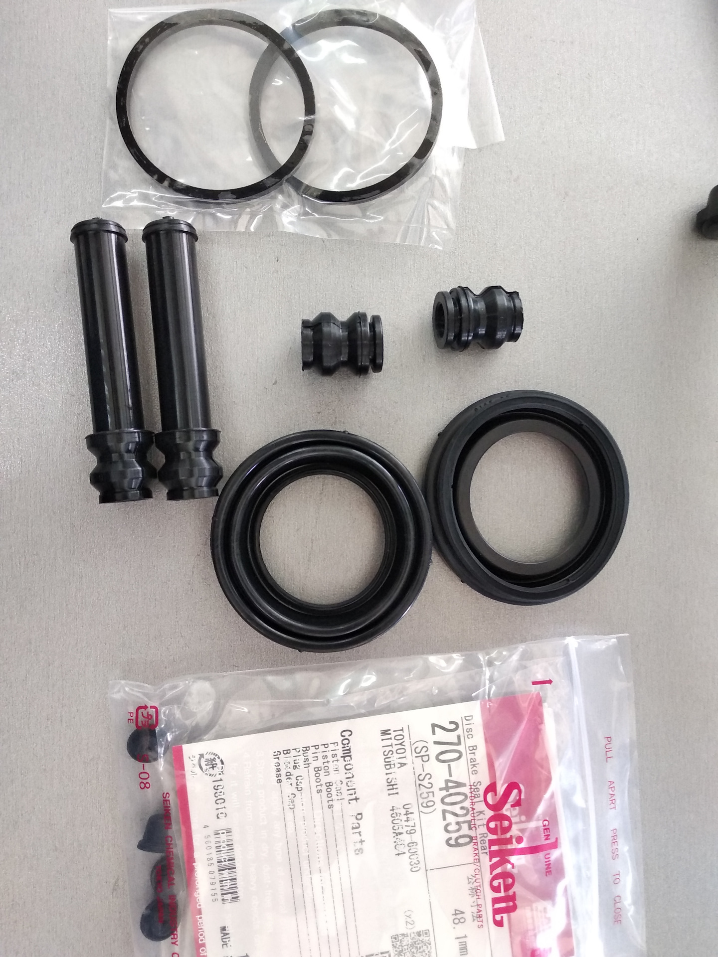 ремкомплект тормозного суппорта прадо 120 передний. ремкомплект переднего суппорта тойота прадо 120. ремкомплект суппорта тойота прадо. ремкомплект переднего суппорта prado 150 тормозного тойота. ремкомплект переднего суппорта прадо 120.