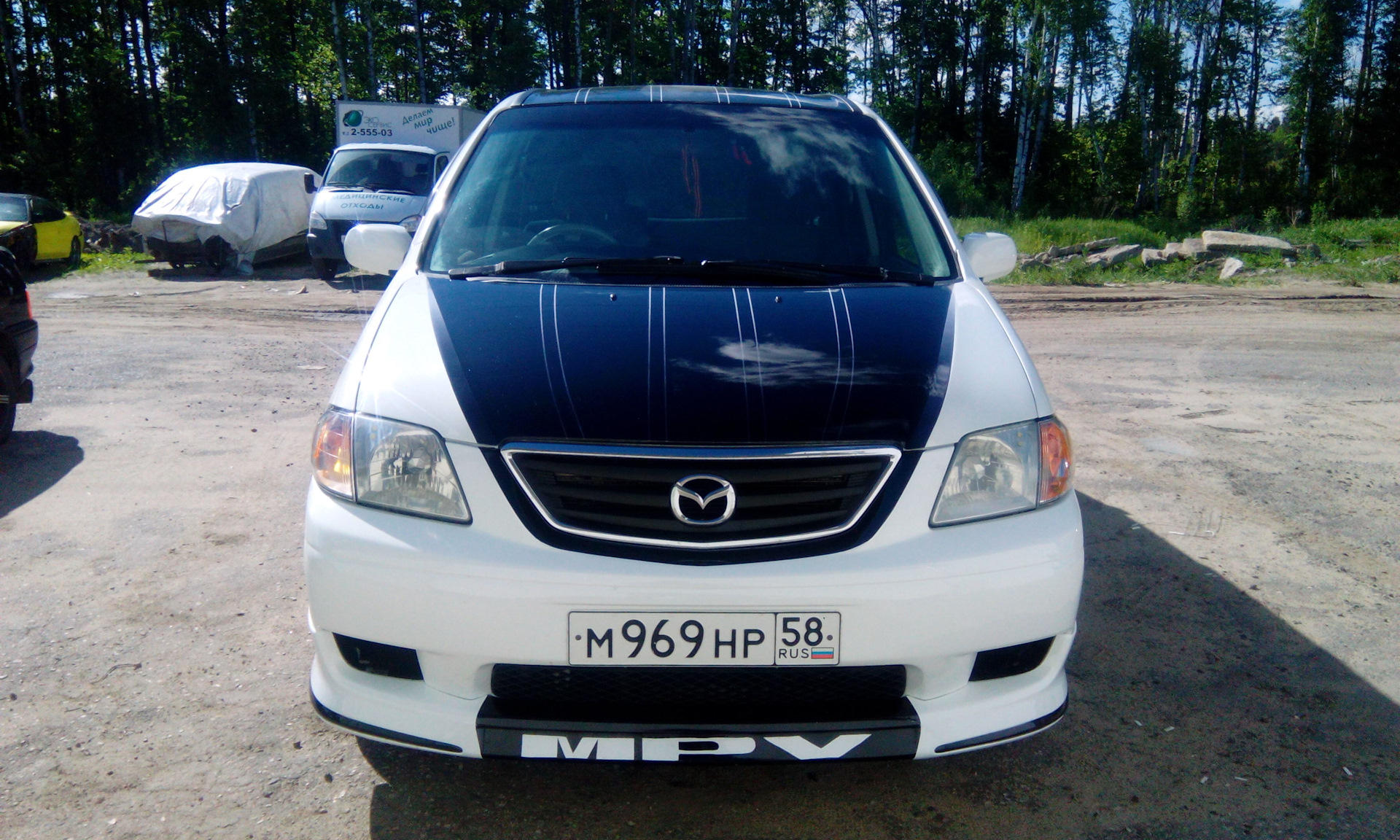 Мазда мпв владивосток. Mazda MPV LX 2004 Москва номера синяя. Мазда MPV клуб. Фото красивые Мазда MPV на больших дисках.
