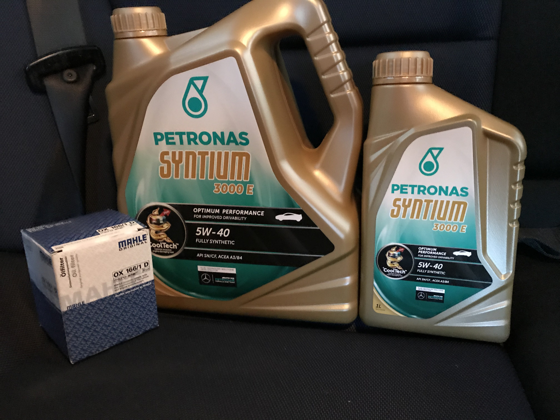 Масло petronas 5w40. Petronas Syntium 5w40. Petronas Syntium 3000 e 5w40. Petronas масло 5w40 JNJ.