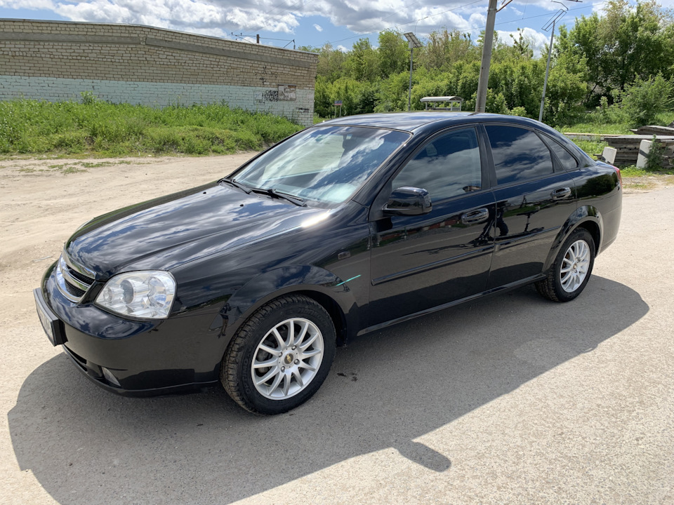 Авито шевроле. Chevrolet Lacetti 2011 седан чёрный. Chevrolet Lacetti седан 2011 седан. Шевроле Лачетти черная седан 2011 год. Шевроле Лачетти седан 1.4 черный.