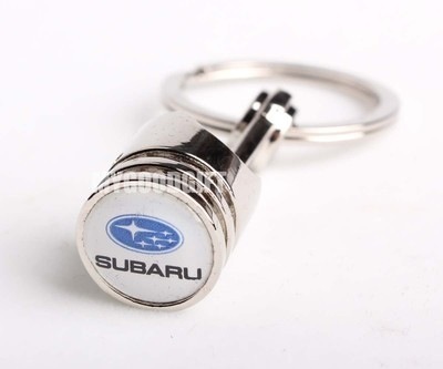 Аксессуары субару. Оригинальные аксессуары Subaru. Кольцо с логотипом Субару. Автотовары для Субару. Резкие аксессуары Subaru.