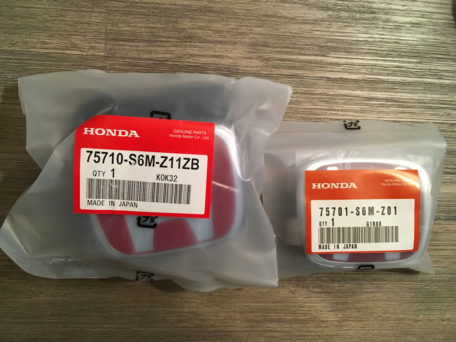 Автозапчасти хонда красноярск. Honda Genuine Parts. Genuine Parts запчасти. 75701-S6m-z01. Honda деталь.