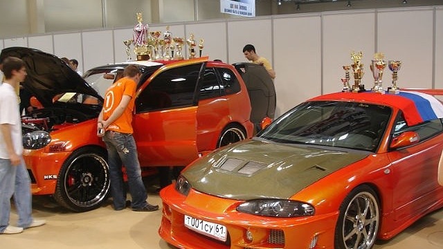 Включи мицубиси. Мицубиси Эклипс оранжевый. Mitsubishi Eclipse оранжевый черный. Митсубиси Эклипс 1 оранжевый. Оранжевый Эклипс Ростов.