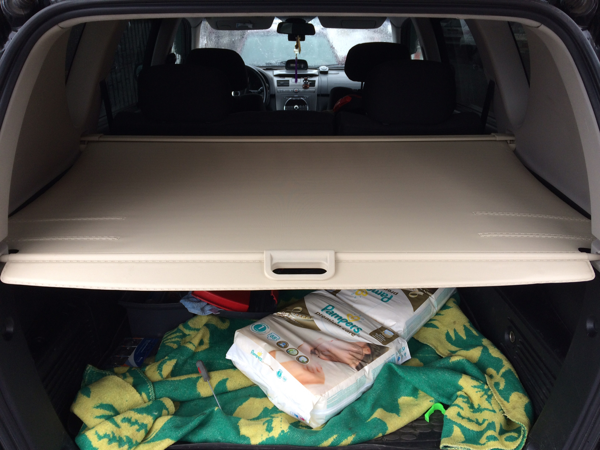 Багажник на санг енг. Шторка багажника SSANGYONG Rexton 2. Шторка в багажник Санг енг Актион 2011 года. Шторка багажника SSANGYONG Kyron 2. Полка багажника Санг енг Актион Нью.