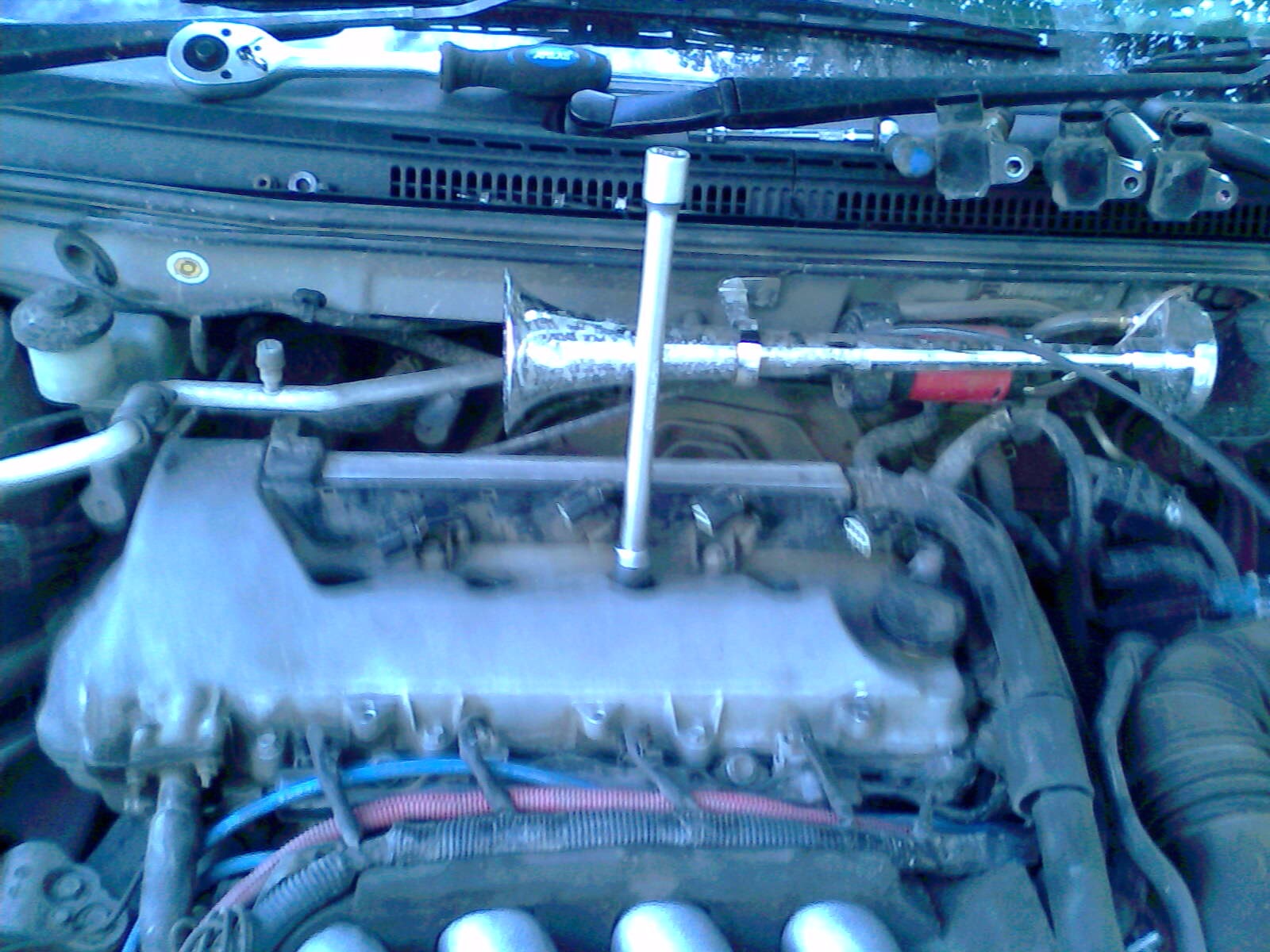 Replacing spark plugs part-2 - Toyota Corolla Runx 18 L 2001