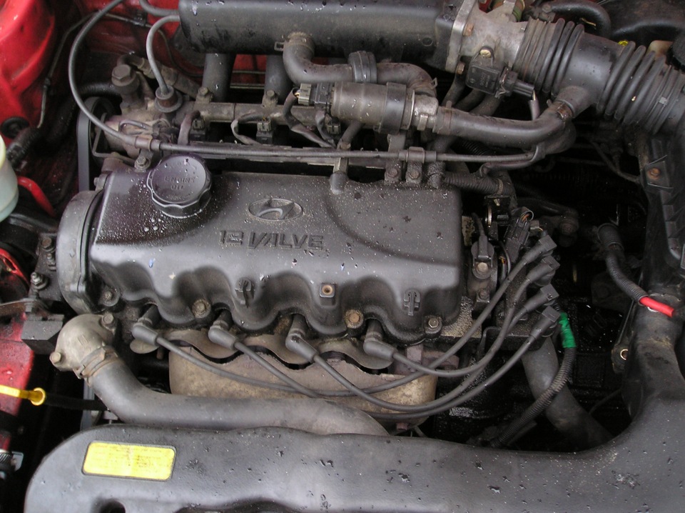 Какой двигатель на акценте. Hyundai Accent 1.3 мотор. Мотор Хундай акцент 1.3. Hyundai Accent 1996 мотор. Хёндай акцент 1998 мотор.