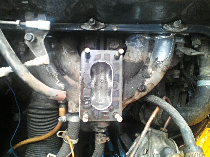 какие прокладки между коллектором и карбюратором. прокладка выпускного коллектора газ 402 двигатель.