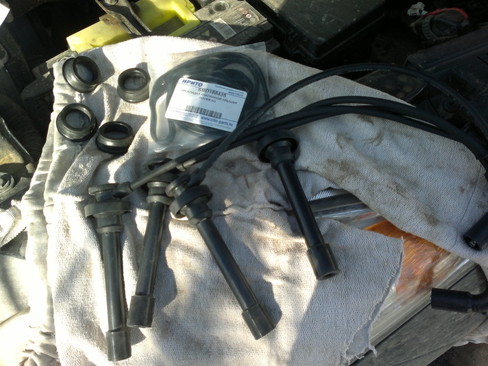 Замена высоковольтных проводов свечей зажигания, уплотнительных колец ...
