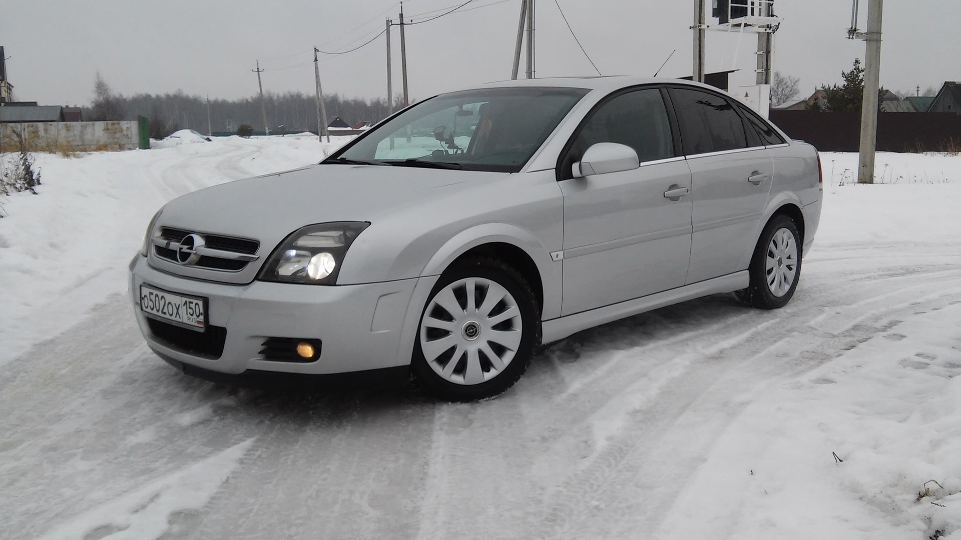 Opel Vectra c серебристый. Opel лифт бэк 2003.