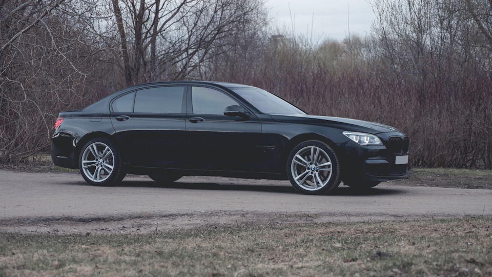 Bmw 7 Series Individual Orange Drive2