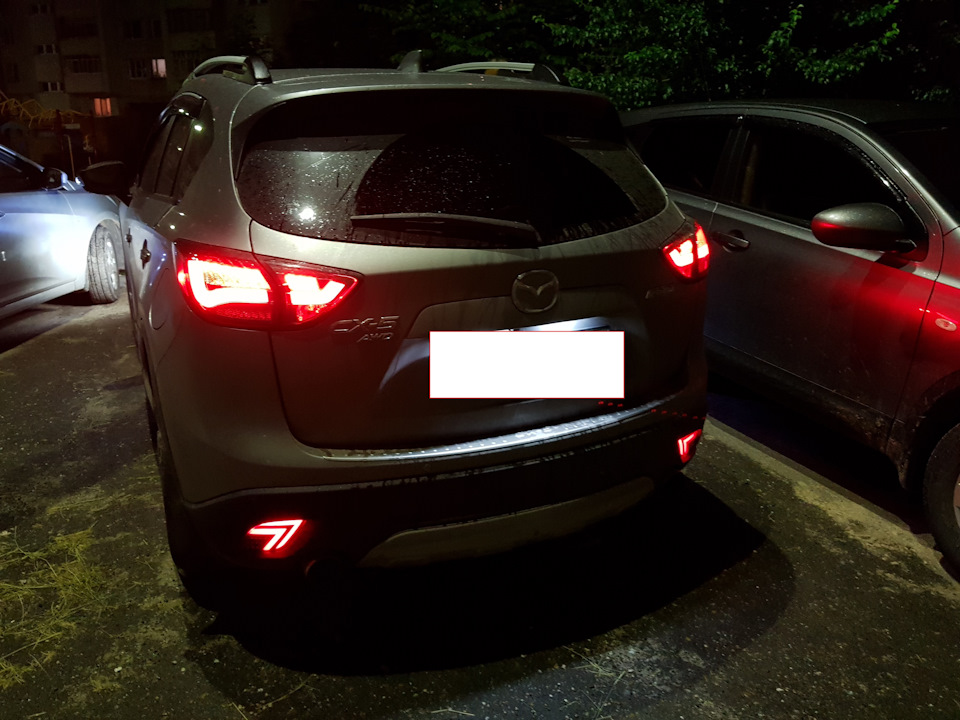 Сколько задних. Задний ПТФ CX-5. Задние led ПТФ Mazda CX-5. Led противотуманки Мазда CX 5. Задние ПТФ cx5 2.0.